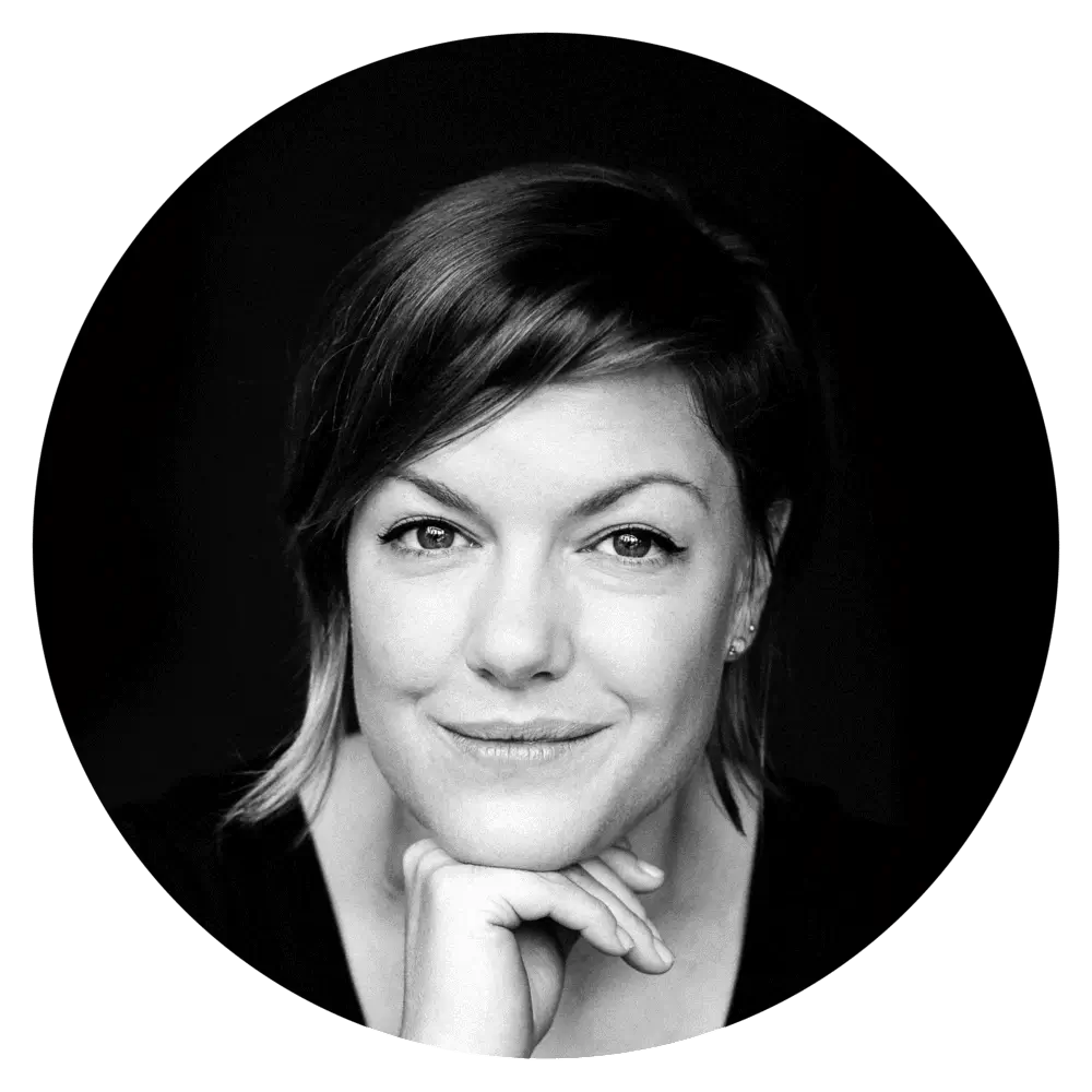 Maria Arango-Kure (she/they) looking into the camera.